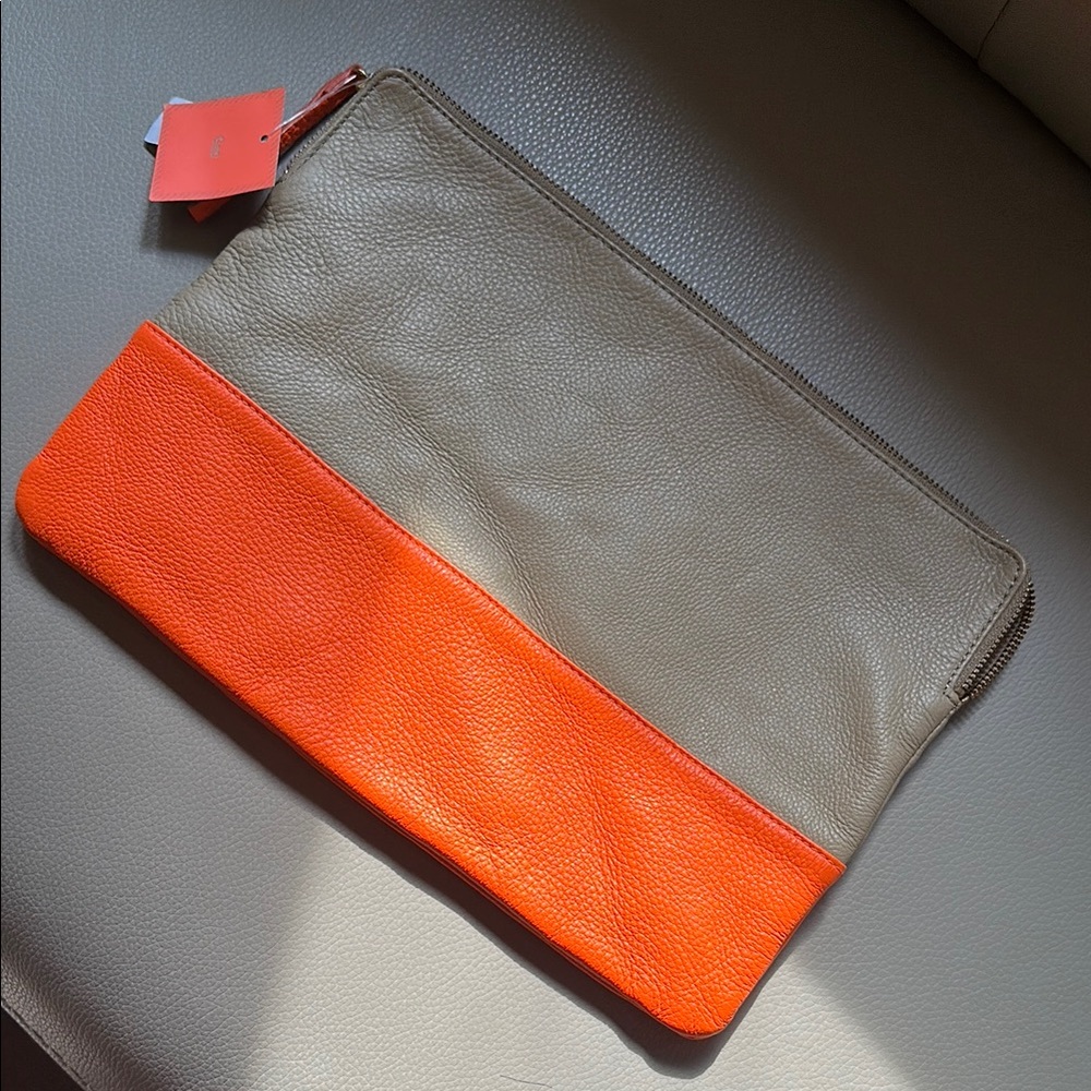 Vibrant Orange and Tan Leather Toiletry Bag with Professional Craftsmanship